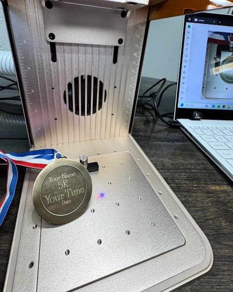 Personalized engraving on an event medal